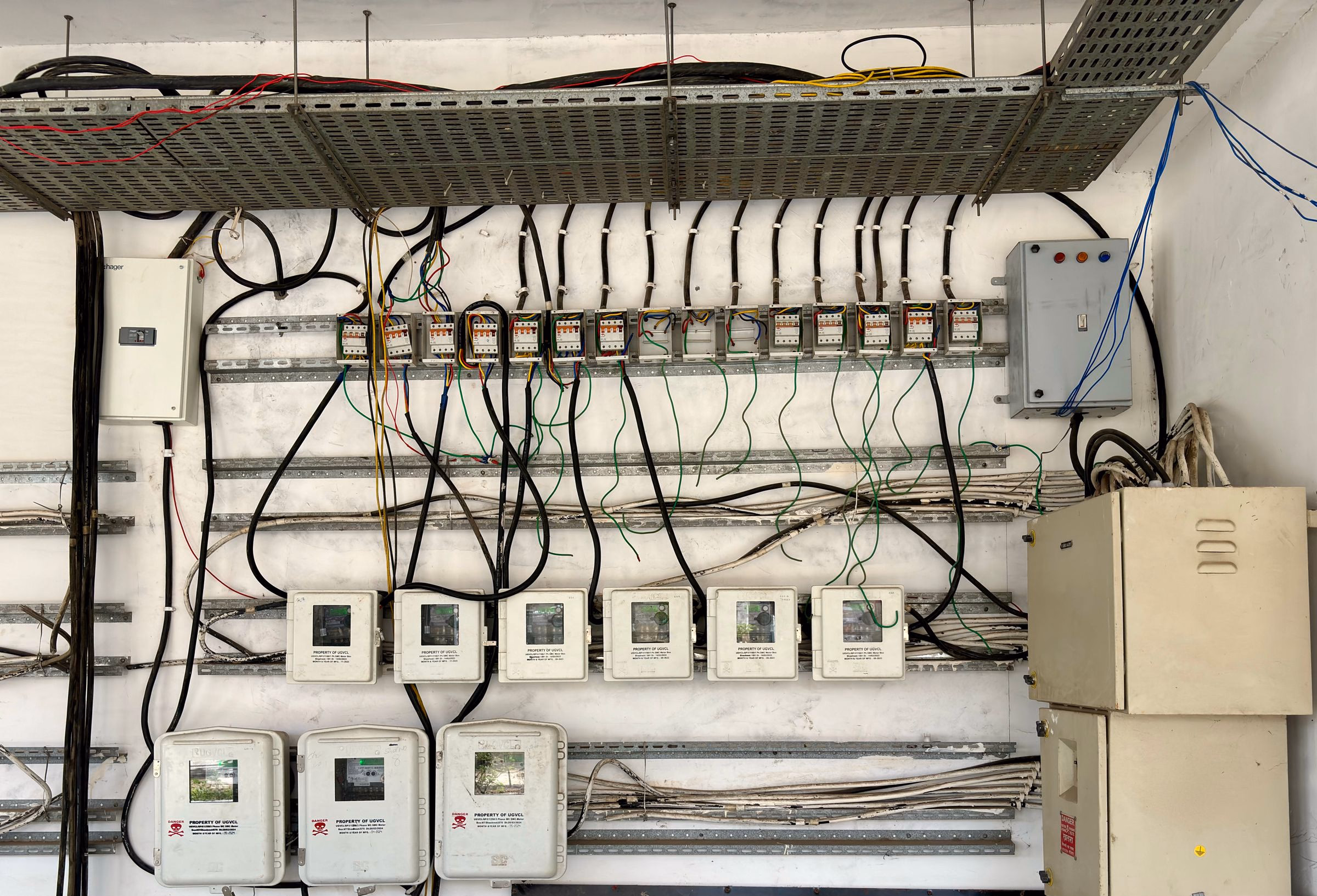 Industrial control cabinet with terminations and labeled cabling.