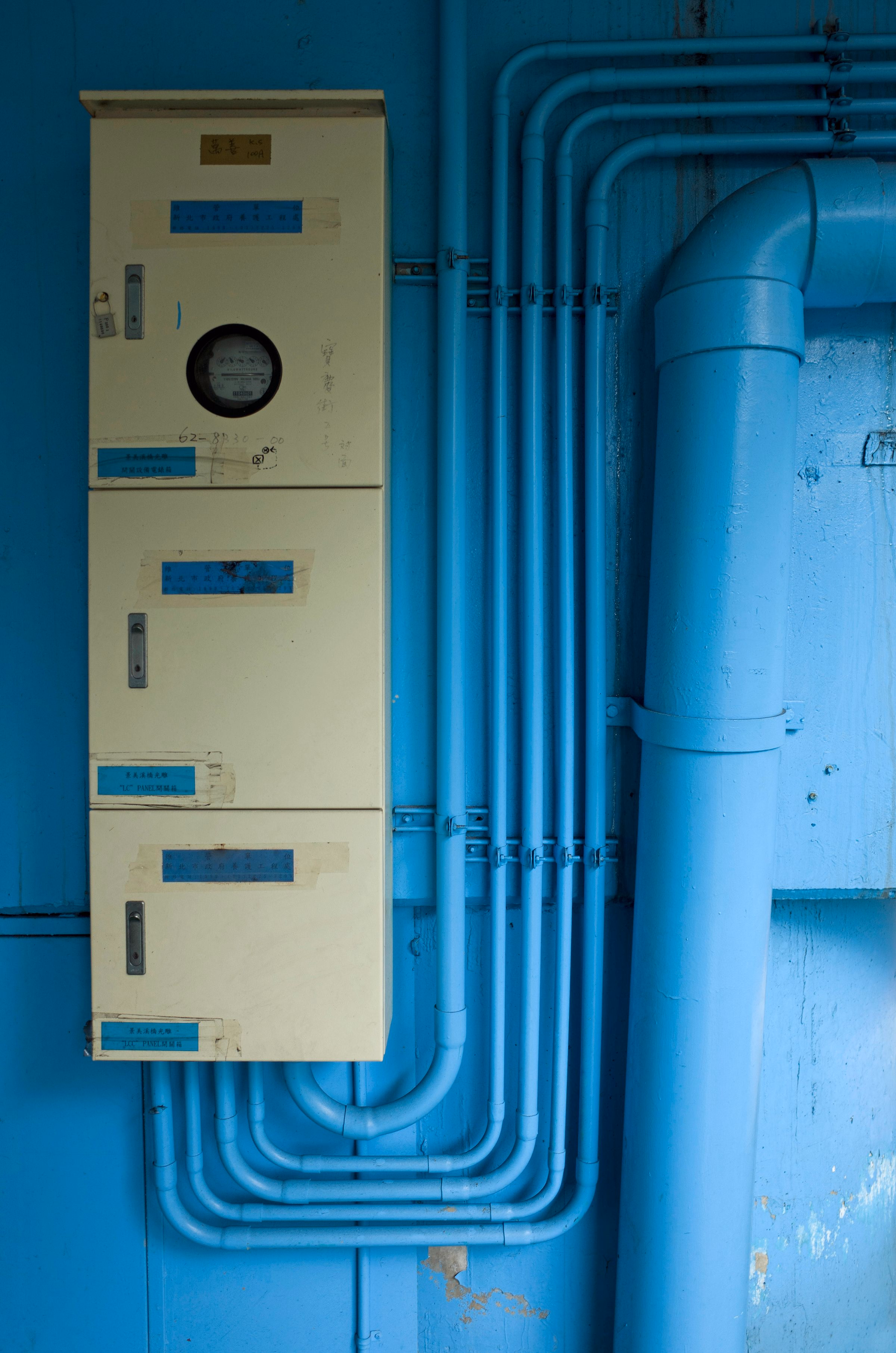 Industrial conduit and meter cabinet, hard structural pattern.